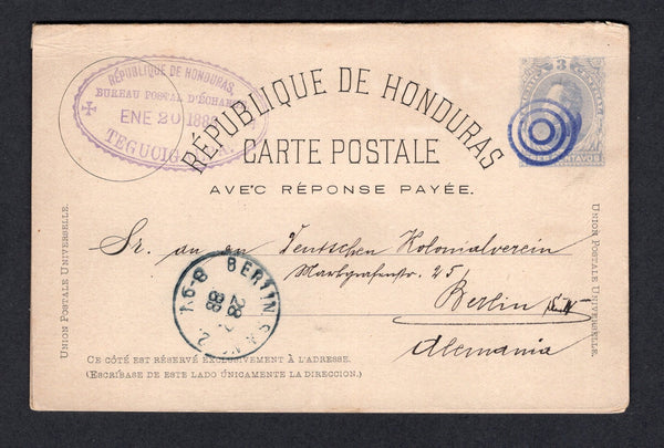 HONDURAS - 1888 - POSTAL STATIONERY: 3c + 3c violet 'Morazan' postal stationery replycard (H&G 4, cards reattached by plain paper tape) datelined 'Yuscaran dd 19 Jan 1888' used with 'Target' cancel and fine oval REPUBLIQUE DE HONDURAS BUREAU POSTAL D'EXCHANGE TEGUCIGALPA cancel in purple dated JAN 20 1888. Addressed to GERMANY with oval ADMINISTRACION DE CORREOS TEGUCIGALPA marking plus two different LONDON transit cds's on reverse and German arrival cds on front. A rare commercial use of this card.  (HON/