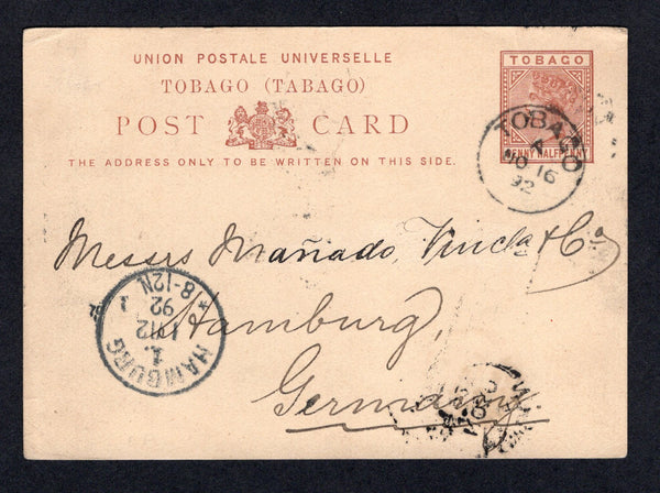 TRINIDAD & TOBAGO - TOBAGO - 1892 - POSTAL STATIONERY: 1½d brown QV postal stationery card (H&G 1) used with fine TOBAGO cds dated NOV 16 1892. Addressed to GERMANY with arrival cds on front and LONDON transit cds on reverse. Full commercial message on reverse.  (TRI/39328)