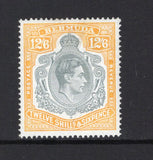 BERMUDA - 1938 - GVI ISSUE: 12/6 grey & pale orange on 'Chalk Surfaced' paper GVI 'Key Type' issue, 1940 printing, comb perf 14. A fine mint copy. 1853 David Brandon certificate accompanies. (SG 120b)  (BER43721)