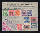 BOLIVIA - 1935 - AIRMAIL & REGISTRATION: Registered airmail cover franked with 1924 10c black & orange red, 25c black & blue and 1b black & red brown 'Establishment of National Aviation School' issue plus 1927 1b scarlet, 1930 10c vermilion, 1931 50c bright magenta, 1933 5c on 1b scarlet and 1933 2c green, 5c dull blue, 15c purple & 25c indigo (SG 170, 172, 174, 202, 255, 264, 273, 278/279 & 281/282) all tied by multiple strikes of the LA PAZ 'CHACO WAR' slogan cancel & cds in purple dated 11 JAN 1935 with