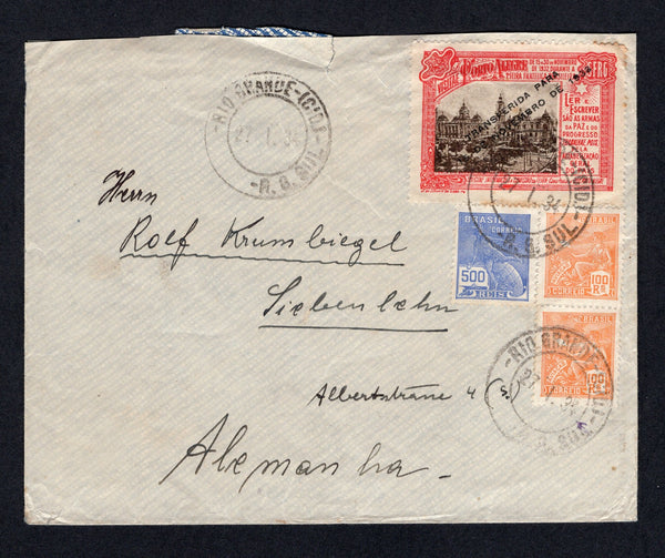 BRAZIL - 1934 - CINDERELLA: Cover franked with 1920 pair 100rs orange and 500rs ultramarine 'Industry' issue (SG 385 & 392) with lovely large format 1933 black & red 'Visitae Porto Alegre Philatelic Exhibition' pictorial CINDERELLA label all tied by RIO GRANDE cds's dated 27. I. 1934. Addressed to GERMANY.  (BRA/37774)
