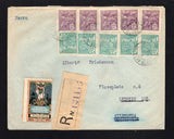 BRAZIL - 1922 - REGISTRATION, CINDERELLA & INDUSTRY ISSUE: Registered cover franked with 1920 strip of three and pair of 50rs blue green and strip of three and pair 150rs violet 'Industry' issue (SG 306 & 311) tied by multiple strikes of PORTO ALEGRE cds dated 7 OUT 1922 with plain printed black on buff registration label alongside and two multicoloured 'Centenario da Independencia do Brasil Exposicao Nacional 1822-1922' CINDERELLA labels on front & reverse. Addressed to GERMANY with arrival mark on revers
