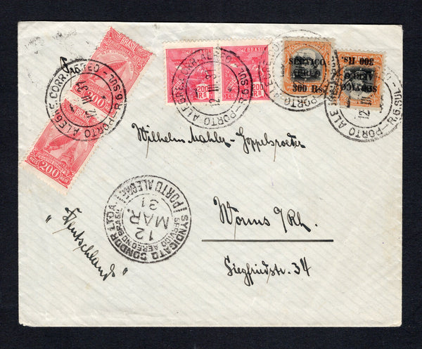 BRAZIL - 1931 - AIRMAIL: Cover franked with 1924 pair 200rs rose red 'Industry' issue, pair 1929 200rs carmine 'Santos Dumont' AIR issue and 2 x 1927 300rs on 500rs black & yellow orange 'SERVICIO AEREO' overprint issue (SG 357, 470 & 445) tied by PORTO ALEGRE CORR. AEREO cds's dated 12 III 1931 with SYNDICATO CONDOR LTDA PORTO ALEGRE transit cds on front. Addressed to GERMANY with CORREIO AEREO RIO DE JANEIRO transit cds on reverse.  (BRA43811)