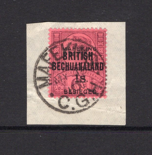 CAPE OF GOOD HOPE - MAFEKING SIEGE STAMPS - 1900 - PROVISIONAL ISSUE: 1/- on 6d purple on rose red QV issue of British Bechuanaland with 'BRITISH BECHUANALAND' overprint and further handstamped 'MAFEKING BESIEGED 1s' in black. A fine used copy tied on small piece by MAFEKING C.G.H. cds dated MY 15 1900. A rare stamp. (SG 15)  (CAP/41628)