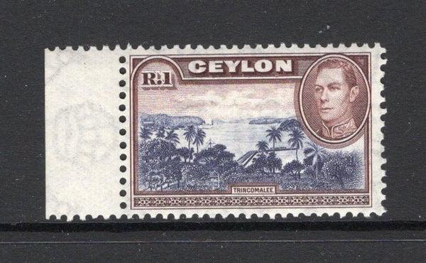 CEYLON - 1938 - GVI ISSUE: 1r blue violet & chocolate GVI issue with watermark sideways, a fine mint side marginal copy. (SG 395)  (CEY/11633)