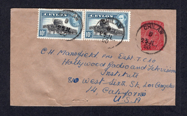 CEYLON - 1950 - POSTAL STATIONERY: 5c carmine on brown wove paper GVI postal stationery envelope (H&G B73 variety - without imprint or embossing and with curved flap) used with added pair 1938 10c black & light blue GVI issue (SG 389) tied by CHILAW cds's dated 25 JL 1950. Addressed to USA.  (CEY/42026)