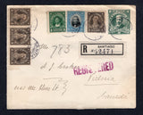 CHILE - 1912 - POSTAL STATIONERY & REGISTRATION: 2c green 'Presidente' postal stationery envelope (H&G B20) used with added 1911 1c green, 3c sepia strip of three & single and 25c black & pale blue 'Presidente' issue (SG 135, 137 & 143) all tied by SANTIAGO cds's with printed 'SANTIAGO' registration label alongside. Addressed to CANADA with transit & arrival marks on reverse.  (CHI32202)