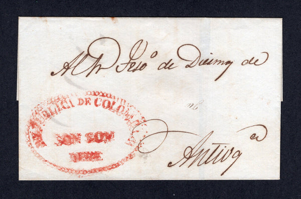 COLOMBIA - 1833 - PRESTAMP: Circa 1833. Cover from SON SON to ANTIOQUIA with fine strike of large oval REPUBLICA DE COLOMBIA SON SON DEBE pearl framed marking in red. Scarce.  (COL/27858)