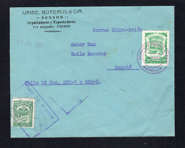COLOMBIAN AIRMAILS - SCADTA - 1922 - AIRMAIL MARKING: Commercial cover with 'Uribe Boteros & Cia SONSON' company imprint at top franked with 1920 3c green National issue (SG 384) tied on arrival by boxed BOGOTA cancel and 1921 30c green SCADTA issue (SG 22) tied by undated MEDELLIN SCADTA cancel in purple with '15 JUN 1922' date handstamp alongside and nice 'Flying Boat' cachet in purple on reverse. Addressed to BOGOTA.  (COL43832)
