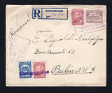 COLOMBIA - 1925 - POSTAL STATIONERY & REGISTRATION: 3c grey violet postal stationery envelope (H&G B7A) used with added 1923 3c blue and 2 x 5c claret (SG 394 & 396) tied by boxed BUCARAMANGA cancels dated DIC 22 1925 and by straight line 'RECOMENDADO' marking in purple with printed blue on white 'BUCARAMANGA' registration label also on front. Addressed to GERMANY with transit & arrival marks on reverse.  (COL45518)