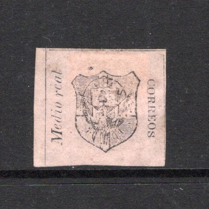 DOMINICAN REPUBLIC - 1865 - CLASSIC ISSUES: 'Medio real' black on rose 'First Issue' a superb unused side marginal copy from position 7 in the sheet of 12. Margins clear at top and both sides, touching at base. No thins or faults, a very rare stamp in this quality. (SG 1)  (DOM43660)