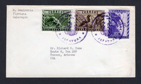 ECUADOR - 1957 - GALAPAGOS ISLANDS: Circa 1957. Cover with typed 'M. Seminario, Floreana, Galapagos' return address at top franked 1957 20c sepia, 50c violet & 1s bronze green 'Galapagos' issue (SG 1/3) tied by two fine strikes of large GUARNICION NAVAL DE FLOREANA JEFATURA 'Arms' cancels in purple. Addressed to USA. Scarce.  (ECU/41799)