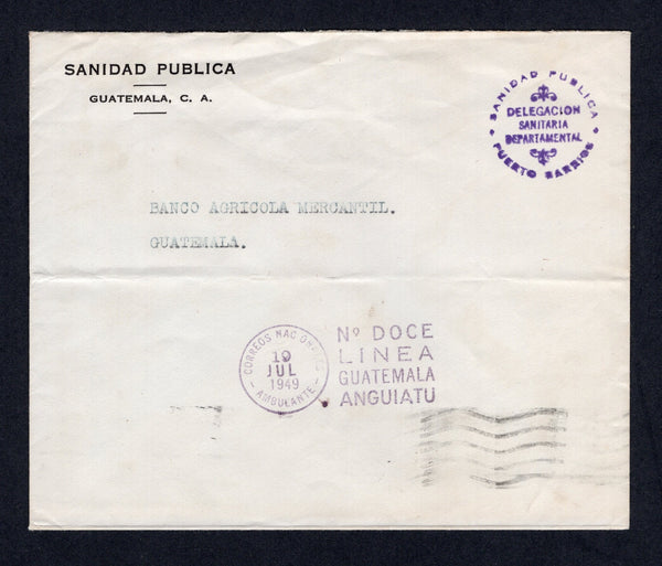 GUATEMALA - 1949 - TRAVELLING POST OFFICES & OFFICIAL MAIL: Stampless official cover with printed 'SANIDAD PUBLICA, GUATEMALA C.A.' at top with 'SANIDAD PUBLICA DELEGACION SANITARIA DEPARTAMENTAL PUERTO BARRIOS' official cachet in purple. Sent from PUERTO BARRIOS to GUATEMALA CITY with fine strike of CORREOS NACIONALES AMBULANTE No. DOCE LINEA GUATEMALA ANGUIATU marking in purple on front and arrival cds on reverse.  (GUA/35267)