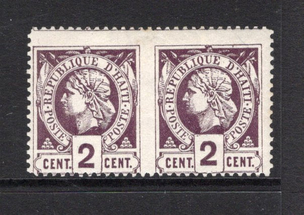 HAITI - 1882 - CLASSIC ISSUES & VARIETY: 2c purple on white PERFORATED 'Liberty Head' issue a fine mint IMPERF BETWEEN HORIZONTAL PAIR. Exceptional quality and very scarce. (SG 10a)  (HAI/43331)