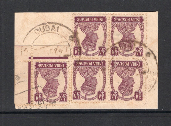 INDIA - 1947 - INDIA USED IN DUBAI: ½a purple GVI issue of India a block of four and corner marginal single tied on piece by two strikes of DUBAI PERSIAN GULF cds dated SET 1947. Scarce. (SG 266)  (IND11724)
