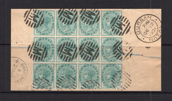 INDIA - 1882 - MULTIPLE: ½a blue green QV issue a block of twelve used on the reverse of a cover tied by multiple strikes of barred 'M' cancel with MANALMEDU cds alongside. The cover was originally addressed to South Africa with DURBAN NATAL arrival cds dated DEC 12 1901 alongside. (SG 85)  (IND12621)