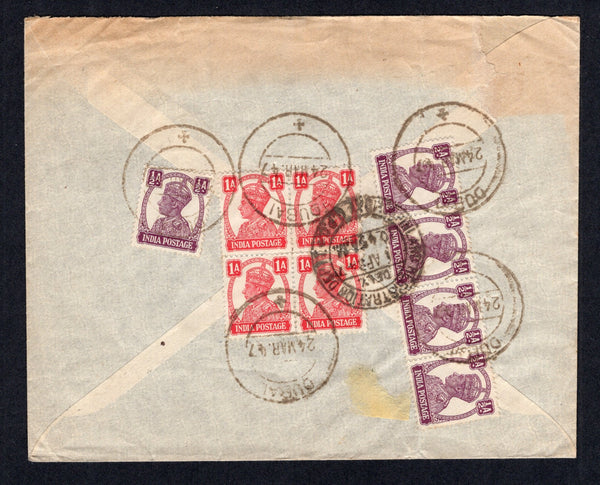 INDIA - 1947 - INDIA USED IN DUBAI: Commercial registered airmail cover franked on reverse with India 1940 ½a purple strip of four and single and 1a carmine block of four GVI issue (SG 266 & 268) tied by multiple strikes of 'DUBAI +' cds's with boxed 'DUBAI PERSIAN GULF DISTRICT' registration marking on front. Addressed to INDIA with arrival cds on reverse. Scarce.  (IND18693)