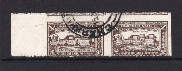 INDIAN STATES - CHARKHARI - 1931 - VARIETY: 1a blackish brown 'Imlia Palace' issue, a fine lightly used side marginal IMPERF BETWEEN HORIZONTAL PAIR. Light crease along central margin. (SG 46a)  (IND39269)