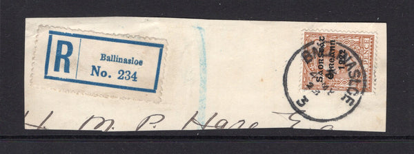 IRELAND - 1922 - PROVISIONAL ISSUE & CANCELLATION: 5d yellow brown GV issue with 'Irish Free State 1922' THOM overprint in blue black tied on large piece by fine strike of BALLINASLOE cds dated 4 MY 1923 with printed blue on white 'Ballinasloe' registration label alongside. (SG 59)  (IRE/32687)