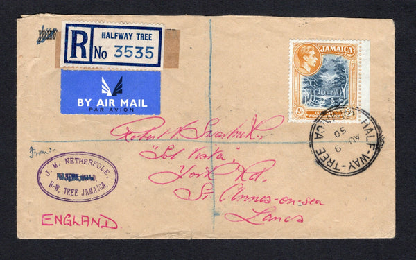JAMAICA - 1940 - HIGH VALUE FRANKING & REGISTRATION: Registered cover franked with single 1938 5/- slate blue & yellow orange GVI issue, perf 13 (SG 132b) tied by fine HALF-WAY TREE cds dated AUG 9 1950 with printed blue & white 'HALFWAY TREE' registration label and airmail label at top left. Addressed to UK with oval KINGSTON transit mark on reverse. A scarce value used on cover.  (JAM/43021)