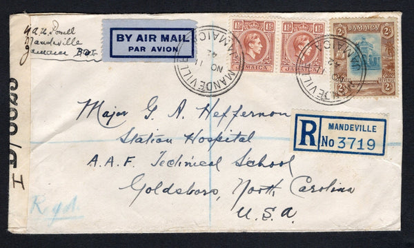 JAMAICA - 1940 - HIGH VALUE FRANKING, REGISTRATION & CENSORED MAIL: Registered cover franked with 1921 2/- light blue & brown GV issue and pair 1938 1½d brown GVI issue (SG 103 & 123) tied by MANDEVILLE cds's dated NOV 11 1942 with printed blue & white 'MANDEVILLE' registration label and airmail label on front. Addressed to USA with 'OPENED BY EXAMINER ID/8823' PC90 censor strip with the 'I' added in manuscript. Transit & arrival marks on reverse. The 2/- in uncommon used on cover.  (JAM/43022)