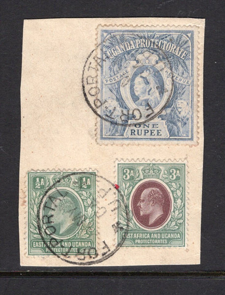 KENYA, UGANDA & TANGANYIKA - 1904 - UGANDA & COMBINATION MAIL: British East Africa ½a grey green and 3a brown purple & green EVII issue used on piece in combination with Uganda 1898 1r dull blue QV issue tied by two strikes of FORT PORTAL U.P. cds dated MAY 1904. Scarce combination piece. (SG 17, 22 & 90)  (KUT/28895)