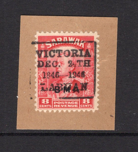 LABUAN - 1946 - SARAWAK USED IN LABUAN: 8c carmine issue of Sarawak with 'BMA' overprint used on small piece with good strike of boxed 'VICTORIA DEC 24TH 1846 - 1946 LABUAN' cancel in black. (SG 112a)  (LAB/23624)