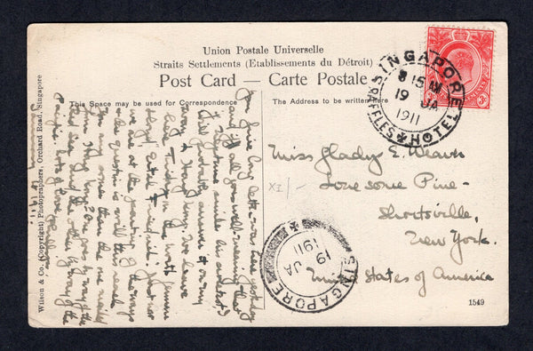 MALAYA - STRAITS SETTLEMENTS - 1911 - CANCELLATION & HOTEL POST: Black & white PPC 'Singapore - Malay Houses' franked on message side with 1906 3c red EVII issue (SG 153) tied by fine SINGAPORE RAFFLES HOTEL cds. Addressed to USA with SINGAPORE transit cds on front.  (MYA/21249)