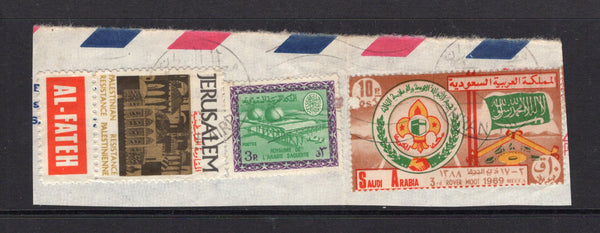PALESTINE - 1969 - CINDERELLA: AL-FATEH rectangular 'JERUSALEM PALESTINIAN RESISTANCE / RESISTANCE PALESTINIENNE AL-FATEH' cinderella label on piece with Saudi Arabia 1966 3p light emerald & reddish violet and 1969 10p 'Scout' issue all tied by DHAHRAN AIRPORT machine cancel dated 1969. (SG 662 & 1031)  (PAL/19717)