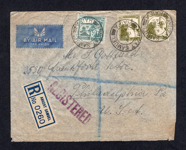 PALESTINE - 1945 - CANCELLATION & REGISTRATION: Registered airmail cover franked with 1927 2 x 20m dull olive green and 100m turquoise blue (SG 99 & 102) tied by three fine strikes of AHUZAT SAMUEL HAIFA cds with printed blue & white 'AHUZAT SAMUEL' registration label alongside. Addressed to USA with transit & arrival marks on reverse.  (PAL/21949)