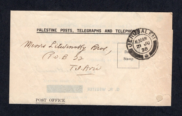 PALESTINE - 1938 - OFFICIAL MAIL: Stampless letter sheet with printed 'Palestine Posts, Telegraphs and Telephones' heading with JERUSALEM cds and large boxed PALESTINE POSTS & TELEGRAPHS HEADQUARTERS REGISTRY official cachet on reverse. Addressed to TEL AVIV.  (PAL/21969)