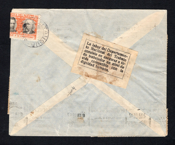 PARAGUAY - 1944 - CINDERELLA & PROPAGANDA: Cover franked with 10 x 1939 50c black & orange (SG 507) tied by multiple strikes of ITAUGUA cds dated 9 NOV 1944. Addressed to ASUNCION with printed black on white label on reverse inscribed 'La labor del Departamento Nacional del Trabajo consiste en asegurar a todo trabajador un nivel de vida compatible con la dignidad humana' which translates as 'The work of the National Department of Labor is to ensure that every worker has a standard of living compatible with