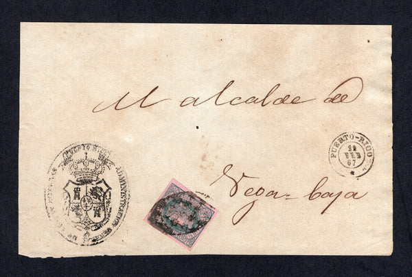 PUERTO RICO - 1867 - CUBA USED IN PUERTO RICO: Official front only with large 'Official' arms cachet in black franked with CUBA 1864 ½r green on rose 'Isabella' issue (SG 16) with four large margins tied by oval 'Parilla' cancel with fine PUERTO RICO cds dated 29 FEB 1867 alongside.  Addressed to VEGA BAYA.  (PUE/34411)