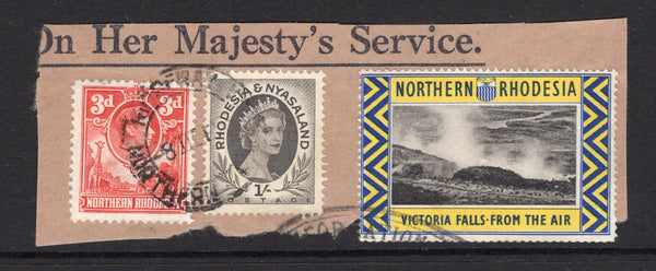 RHODESIA - NORTHERN RHODESIA - 1954 - CINDERELLA: 3d scarlet GVI issue and Rhodesia & Nyasaland 1954 1/- grey black QE2 issue used on 'OHMS' piece by RIDGEWAY cds with fine 'Northern Rhodesia - Victoria Falls from the Air' blue, black & yellow CINDERELLA label tied alongside. (SG 35 & 9)  (RHO/15556)