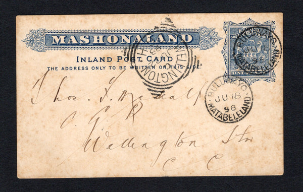 RHODESIA - 1898 - POSTAL STATIONERY: 1d blue 'Mashonaland' INLAND POST postal stationery card (H&G 5) used with two strikes of BULUWAYO MATABELELAND cds dated JUN 18 1898. Addressed to WELLINGTON STATION, CAPE COAST with WELLINGTON C.G.H. squared circle transit cds on front and WELLINGTON STATION arrival cds on reverse. The card has light overall toning but scarce.  (RHO/42966)
