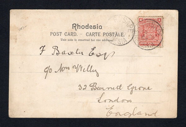 RHODESIA - 1904 - CANCELLATION: Black & white PPC 'Group of Boys (Umtassas)' franked on message side with 1898 1d rose 'Arms' issue (SG 77) tied by RUSAPE cds dated AP 30 1904 with second strike alongside. Addressed to UK.  (RHO/42973)