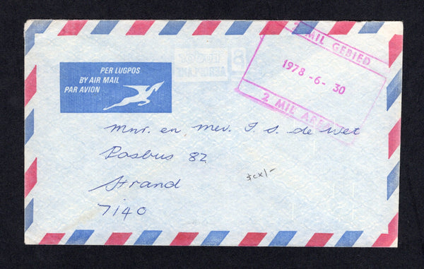 SOUTH AFRICA - 1978 - FORCES IN ANGOLA: Stampless airmail cover sent by a South African soldier serving in Angola with manuscript '74347626 BG SKU J.S. de Wet 53 - Bateljon 29/6/78' return address on reverse with large boxed '2 MIL GEBIED 1978-6-30 2 MIL AREA' cachet in magenta on front and small boxed 'GOEDGEKEUR DEUR SENSOR PASSED BY CENSOR' cachet in magenta with officers initials on reverse. Addressed to SOUTH AFRICA.  (SAF/22088)