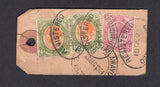 SOUTH AFRICA - 1924 - REGISTRATION: Tiny registered baggage label franked on reverse with 1913 2d dull purple and 2 x 4d orange yellow & olive green GV Head issue (SG 6 & 10) tied by oval REGISTERED GRAHAMSTOWN cancels. Addressed to BULAWAYO, RHODESIA with arrival mark on reverse. Fine & scarce item.  (SAF22476)