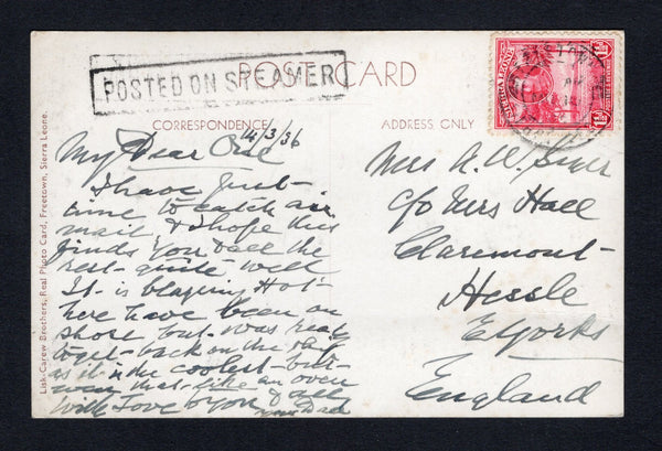 SIERRA LEONE - 1936 - GV ISSUE & MARITIME: Real photographic sepia PPC 'Picking Palm Kernels. Sierra Leone' franked on message side with single 1932 1½d carmine GV issue (SG 157) tied by FREETOWN cds dated MAR 16 1936 with good strike of boxed 'POSTED ON STEAMER' marking in black alongside. Addressed to UK.  (SIE/43223)