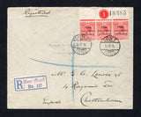 TOGO - 1915 - REGISTRATION & VARIETY: Registered cover franked with top marginal strip of three 1915 1d red GV issue with 'TOGO ANGLO-FRENCH OCCUPATION' overprint and '1' plate number and '18385' sheet number handstamp in margin with the centre stamp showing variety 'MISSING HYPHEN AFTER ANGLO' (SG H35 & H35c) tied by two fine strikes of LOME cds dated 3.12.15 with blue on white registration label with 'Lome (Togo)' fancy handstamp in purple alongside. Addressed to UK with three line 'PASSED BY CENSOR AT L