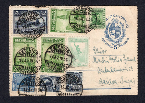 URUGUAY - 1934 - POSTAL STATIONERY: 5c blue postal stationery lettercard (H&G A18, with outer perforations removed) used with added 1921 1c pale green, 1923 12c deep blue, 1928 2c green, 1930 3 x 3c yellow green & 20c slate blue and 1933 2 x 7c slate blue (SG 380, 427, 545, 642, 647 & 691) all tied by EXTERIOR MONTEVIDEO cds's. Addressed to SWITZERLAND with transit cds on reverse.  (URU/26884)