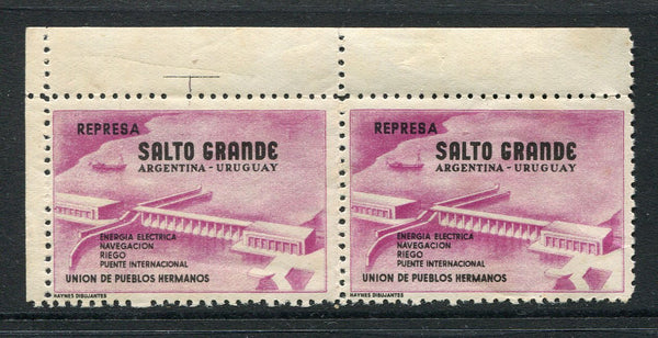 URUGUAY - 1974 - CINDERELLA: Circa 1974. Purple & black label inscribed 'Represa Salto Grande - Union de Pueblos Hermanos' showing the repaired Salto hydro-electric dam. A fine mint pair. Very attractive.  (URU/3390)