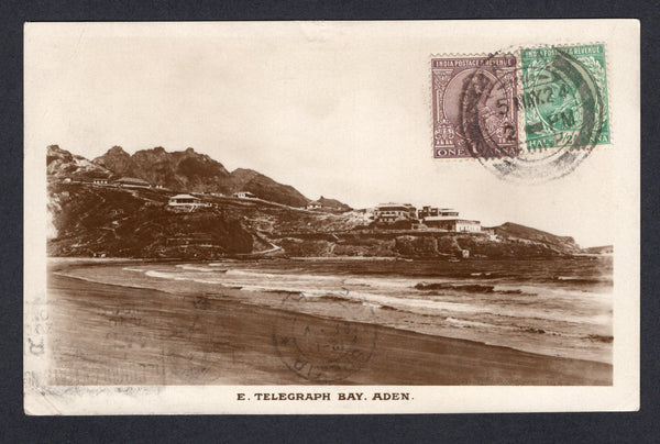 ADEN - 1924 - INDIA USED IN ADEN & POSTCARD: Black & white real photographic PPC 'Telegraph Bay, Aden' franked on picture side with 1911 ½a light green and 1922 1a chocolate GV issue (SG 155 & 197) tied by ADEN cds. Addressed to ITALY.  (ADE/27405)