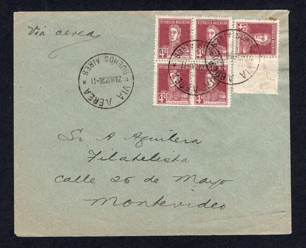 ARGENTINA - 1926 - AIRMAIL: Cover franked with block of four and single 1924 4c plum 'San Martin' issue (SG 533) tied by VIA AEREA BUENOS AIRES cds's dated 28 MAY 1926 with manuscript 'Via Aerea' at top left. Addressed to MONTEVIDEO, URUGUAY with arrival cds dated the same day on reverse. This cover was flown by the Junkers Mission that ran the Buenos Aires - Montevideo route between March 1926 and October 1927. Scarce.  (ARG/27961)