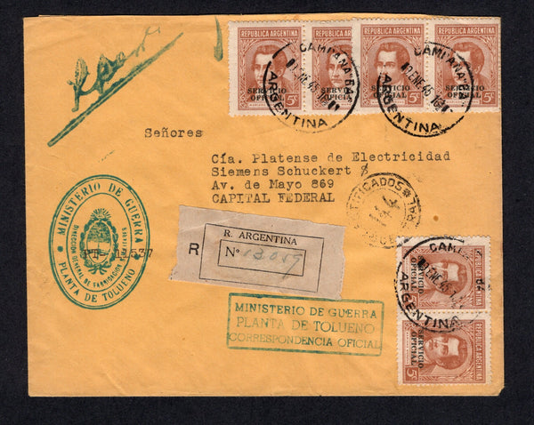 ARGENTINA - 1945 - OFFICIAL MAIL: Registered official cover franked with 6 x 1942 5c brown 'SERVICIO OFICIAL' overprint issue (SG O718) tied by multiple strikes of CAMPANA B.A. cds dated 10 JAN 1945 with oval 'MINISTERIO DE GUERRA PLANTA DE TOLUENO' official 'Arms' cachet and additional boxed cachet and official 'Signature' handstamp all in blue. Addressed locally within BUENOS AIRES with arrival mark on front.  (ARG/41383)