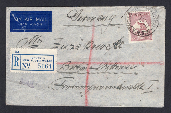 AUSTRALIA - 1938 - ROO ISSUE & HIGH VALUE FRANKING: Registered cover franked with single 1931 2/- maroon 'Roo' issue (SG 134) tied by REGISTERED SYDNEY cds dated 6 JUN 1938 with printed blue on white registration label alongside. Sent airmail to GERMANY with transit & arrival marks on reverse.  (AUS/39247)