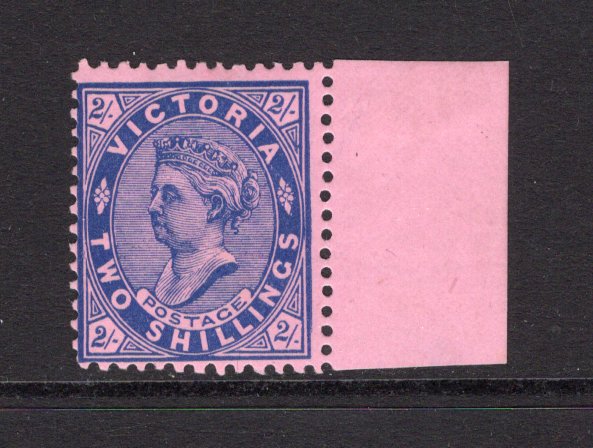 AUSTRALIAN STATES - VICTORIA - 1901 - QV ISSUE: 2/- blue on rose QV issue inscribed 'POSTAGE', watermark 'V over Crown', a fine mint side marginal copy. (SG 395)  (AUS/41569)