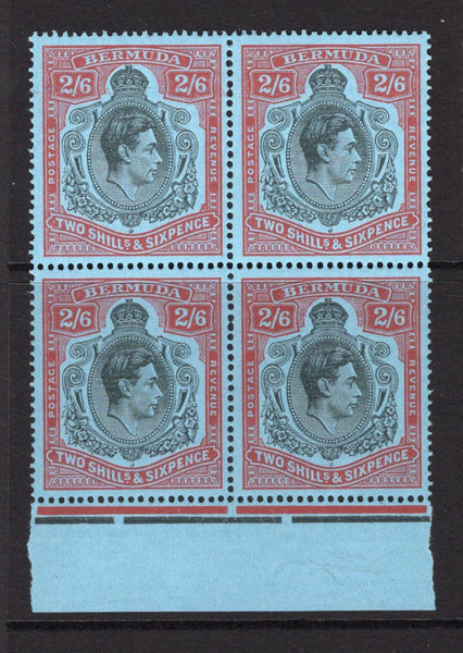 BERMUDA - 1938 - GVI ISSUE: 2/6 black & deep red on grey blue 'Chalk surfaced' paper GVI 'Key Type' issue, 1938 printing, comb perf 14 x 13¾. A fine unmounted mint bottom marginal block of four. (SG 117, Murray Payne #12)  (BER/27733)