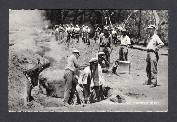 BOLIVIA - 1933 - CHACO WAR: Real photographic black & white PPC of Soldiers firing mortar guns from a trench inscribed 'GUERRA DEL CHACO Morteros en accion' on picture side and 'Editor y Fotografo LUIS BAZOBERRI G. Casilla 11 Cochabamba (Bolivia) Prohibida la reproduccion' on message side. Fine unused & very scarce.  (BOL/17379)