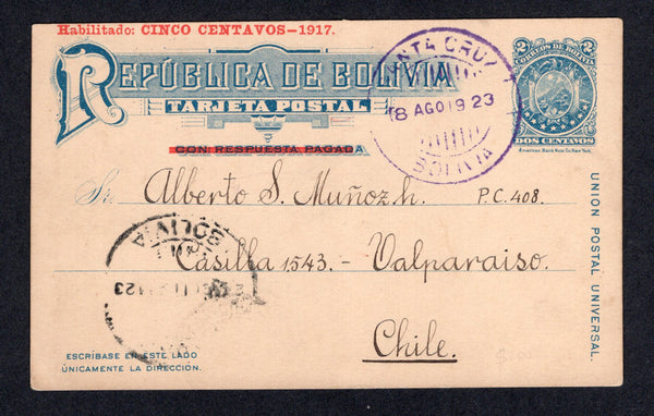 BOLIVIA - 1923 - POSTAL STATIONERY & CANCELLATION: 5c on 2c blue postal stationery card with 'Habilitado CINCO CENTAVOS - 1917' overprint in red (H&G 8) used with SANTA CRUZ cds in violet. Addressed to CHILE with transit and arrival marks on front & reverse.  (BOL/19106)